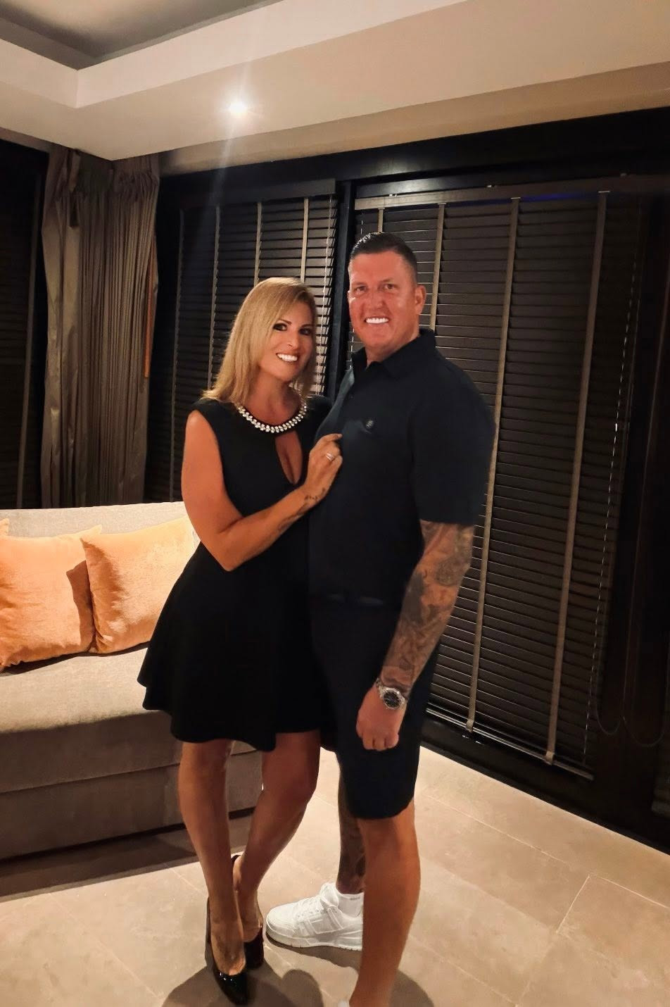 Katie and Matt out for the evening, both dressed in black